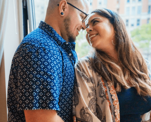 Man and woman looking at each other and smiling