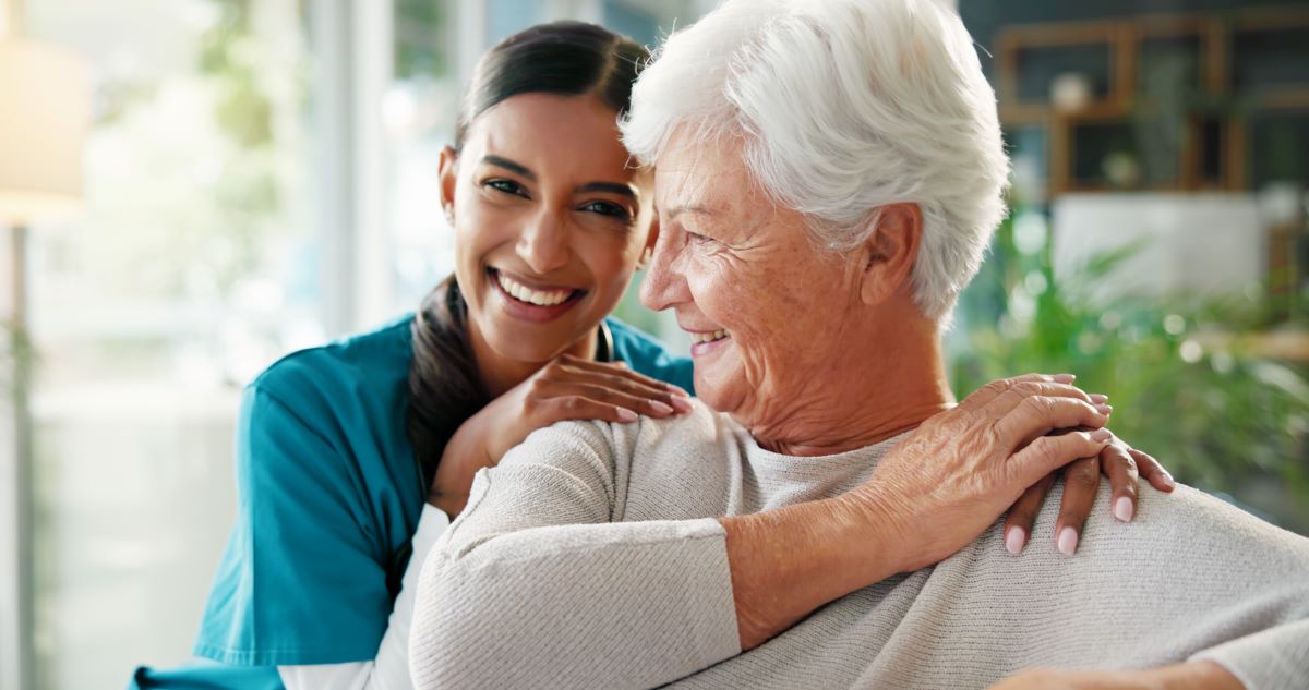 Woman leaning on the shoulder of a second woman