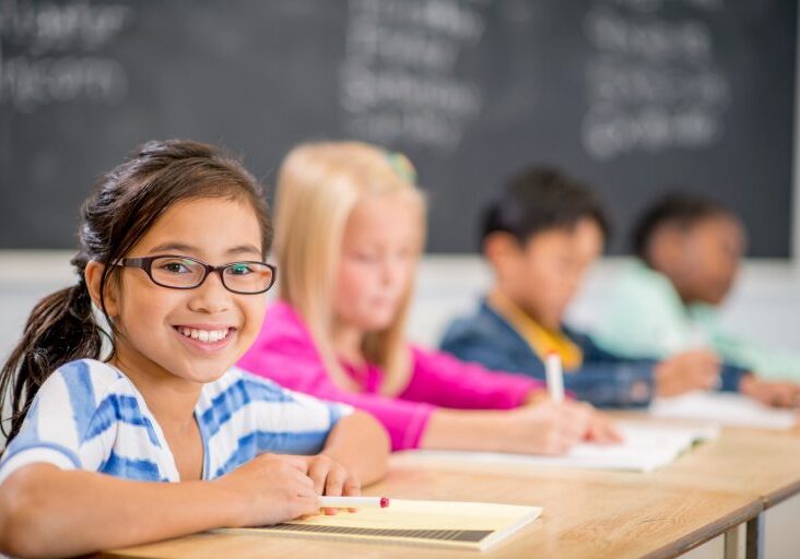 an image of a school girl in glasses