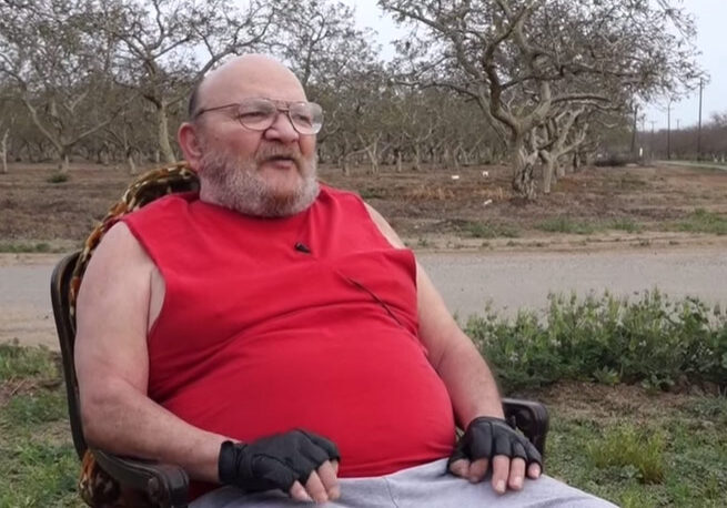 an image of Daniel Leal in his wheelchair sitting outside