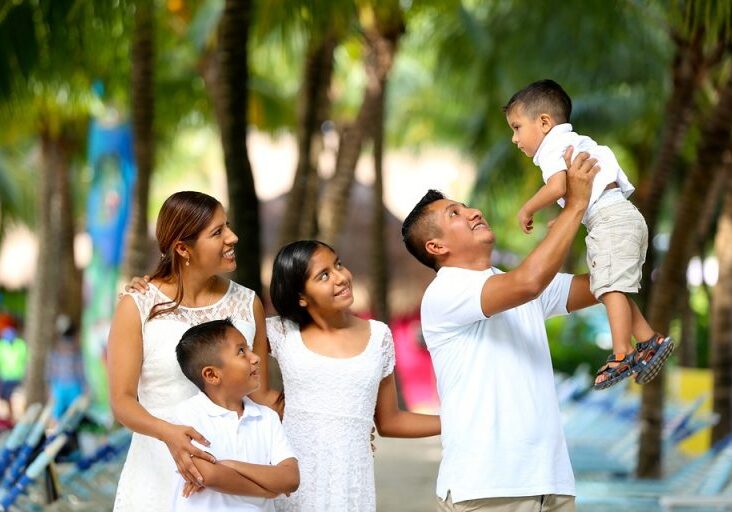 An image of a happy family outdoors