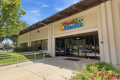 Exterior of a Peach Tree Health clinic